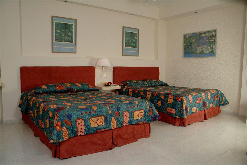 Hotel Y Suites Nader Cancún Exterior foto