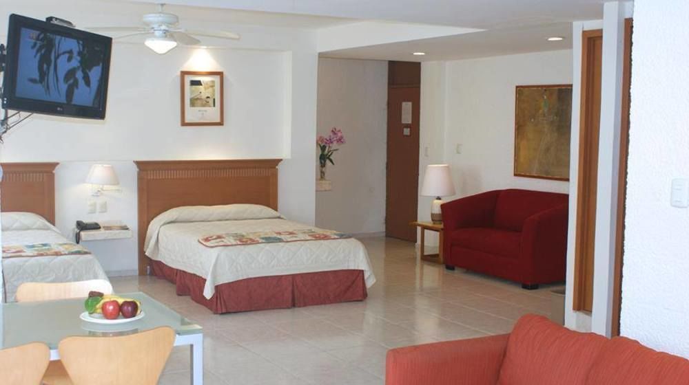 Hotel Y Suites Nader Cancún Exterior foto