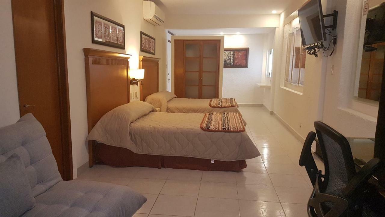 Hotel Y Suites Nader Cancún Exterior foto